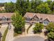 Aerial view of townhouses each with individual garages and private driveways at 809 Davidson Point Rd, Cary, NC 27513