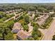 Aerial view of the neighborhood and surrounding lush greenery at 809 Davidson Point Rd, Cary, NC 27513