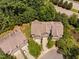 An aerial view of townhomes with mature trees and a beautifully landscaped neighborhood at 809 Davidson Point Rd, Cary, NC 27513