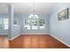 Open dining area with hardwood floors, recessed lighting, and natural light at 809 Davidson Point Rd, Cary, NC 27513