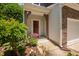 Front door with covered porch and landscaping at 809 Davidson Point Rd, Cary, NC 27513
