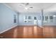 Spacious living room featuring hardwood floors, natural light, and neutral paint at 809 Davidson Point Rd, Cary, NC 27513