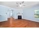 Cozy living room featuring hardwood floors and fireplace at 809 Davidson Point Rd, Cary, NC 27513