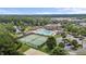 An aerial view of the neighborhood pool, clubhouse, tennis courts and surrounding neighborhood at 948 Consortium Dr, Raleigh, NC 27603
