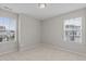 Neutral bedroom with carpeted floor and windows offering plenty of natural light at 948 Consortium Dr, Raleigh, NC 27603