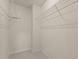 A walk-in closet with wire shelving to help keep all your things organized at 948 Consortium Dr, Raleigh, NC 27603