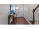 Entryway features hardwood floors and a stylish console table at 948 Consortium Dr, Raleigh, NC 27603