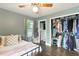 Comfortable bedroom showcasing a walk-in closet and attached bathroom for convenience at 1015 S 1St St, Smithfield, NC 27577