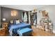 Bright bedroom features a walk-in closet and comfortable queen bed at 1015 S 1St St, Smithfield, NC 27577