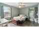 Bright, naturally lit bedroom featuring wood floors and spacious desk at 1015 S 1St St, Smithfield, NC 27577