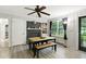 Charming dining area featuring a wooden table, fireplace, and bright natural light at 1015 S 1St St, Smithfield, NC 27577