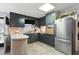 Traditional kitchen with stainless steel refrigerator and vintage oven at 1015 S 1St St, Smithfield, NC 27577