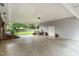 Expansive covered patio overlooking the backyard, ideal for outdoor gatherings and leisure at 1015 S 1St St, Smithfield, NC 27577