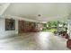 Spacious covered patio with seating area, perfect for outdoor entertaining and relaxation at 1015 S 1St St, Smithfield, NC 27577