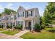 Beautiful two-story townhome with tidy landscaping and a welcoming entrance at 102 Harvest Oaks Lane # 38, Durham, NC 27703