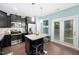 Modern kitchen featuring dark cabinets, granite counters and stainless steel appliances at 102 Harvest Oaks Lane # 38, Durham, NC 27703