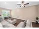 Cozy living room with hardwood floors, plenty of natural light, and neutral tones at 102 Harvest Oaks Lane # 38, Durham, NC 27703