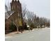 Exterior view of the church on the road with sidewalk, landscaping and lampposts at 103 Cimmaron Ct, Cary, NC 27511