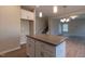 Modern kitchen featuring a center island with gray countertops, white cabinets and stainless steel appliances at 108 Freedom Heights Ln # 147, Smithfield, NC 27577