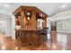 Finished basement bar with seating perfect for entertainment and socializing with guests at 11124 Penderwood Ct, Raleigh, NC 27617