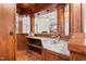 Finished basement bar with granite countertop and storage for entertainment and socializing with guests at 11124 Penderwood Ct, Raleigh, NC 27617