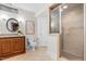 Finished basement bathroom featuring a walk-in shower and granite vanity top at 11124 Penderwood Ct, Raleigh, NC 27617