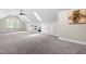 Bonus room with built-in shelving and skylights, offering ample natural light and versatile space at 11124 Penderwood Ct, Raleigh, NC 27617