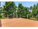 Deck with a gas grill, offering an outdoor cooking and entertainment space with backyard views at 11124 Penderwood Ct, Raleigh, NC 27617
