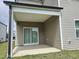 A covered outdoor back patio area, perfect for entertaining guests or enjoying a relaxing evening at 112 Wilbur Lake Dr, Fuquay Varina, NC 27526