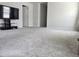 Large, carpeted bonus room with ample space for entertaining and relaxation at 112 Wilbur Lake Dr, Fuquay Varina, NC 27526