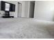 Spacious carpeted bonus room featuring a tv and an abundance of space at 112 Wilbur Lake Dr, Fuquay Varina, NC 27526