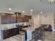 Kitchen features a large island with bar seating, granite countertops, and stainless appliances at 112 Wilbur Lake Dr, Fuquay Varina, NC 27526