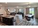 Open-concept living area with kitchen, dining, and living spaces at 112 Wilbur Lake Dr, Fuquay Varina, NC 27526