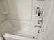 Close-up view of a clean, white shower interior with built-in shelving at 112 Wilbur Lake Dr, Fuquay Varina, NC 27526