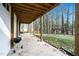 Covered back patio with a ceiling and grill perfect for outdoor dining and relaxation at 1128 E Geer St, Durham, NC 27704