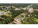 An aerial view showcases the community and surrounding areas, with trees and houses, and a water tower in the distance at 12658 W Hanes Ave, Middlesex, NC 27557