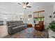 Spacious living room with natural light, an open layout, and stylish decor at 12658 W Hanes Ave, Middlesex, NC 27557