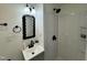 Bathroom featuring new vanity, lighting, and a tiled shower at 1336 Hill Street St, Rocky Mount, NC 27801