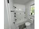 Bathroom featuring white subway tile and black hardware at 1336 Hill Street St, Rocky Mount, NC 27801