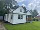 Quaint single-Gathering home showcasing a well-manicured lawn and classic siding at 1336 Hill Street St, Rocky Mount, NC 27801