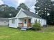 Charming single-story home featuring a cozy front porch and well-maintained lawn at 1336 Hill Street St, Rocky Mount, NC 27801