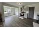 Well-lit kitchen featuring gray cabinets, stainless steel appliances, and hardwood flooring at 1336 Hill Street St, Rocky Mount, NC 27801
