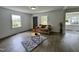 Well-lit living room featuring hardwood floors and comfortable seating at 1336 Hill Street St, Rocky Mount, NC 27801