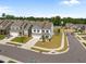 Aerial shot of a two-story home with white siding, set in a cul-de-sac neighborhood at 14 Shady Oaks Rd, Angier, NC 27501