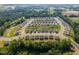 Aerial view of a well-maintained suburban neighborhood, showcasing organized streets and green spaces at 14 Shady Oaks Rd, Angier, NC 27501