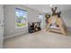 Bright bedroom featuring carpet flooring, natural light, and a teepee bed perfect for a room at 14 Shady Oaks Rd, Angier, NC 27501