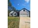 Charming one-story home with attached garage and driveway at 1414 Sagamore Dr, Louisburg, NC 27549
