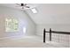 Bright bonus room with dormer windows and carpet at 14236 Wyndfield Cir, Raleigh, NC 27615