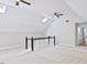 Spacious bonus room featuring carpeting, ceiling fans, and dormer windows at 14236 Wyndfield Cir, Raleigh, NC 27615
