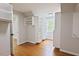Walk-in closet with built-in shelves and natural light, next to a bedroom at 14236 Wyndfield Cir, Raleigh, NC 27615